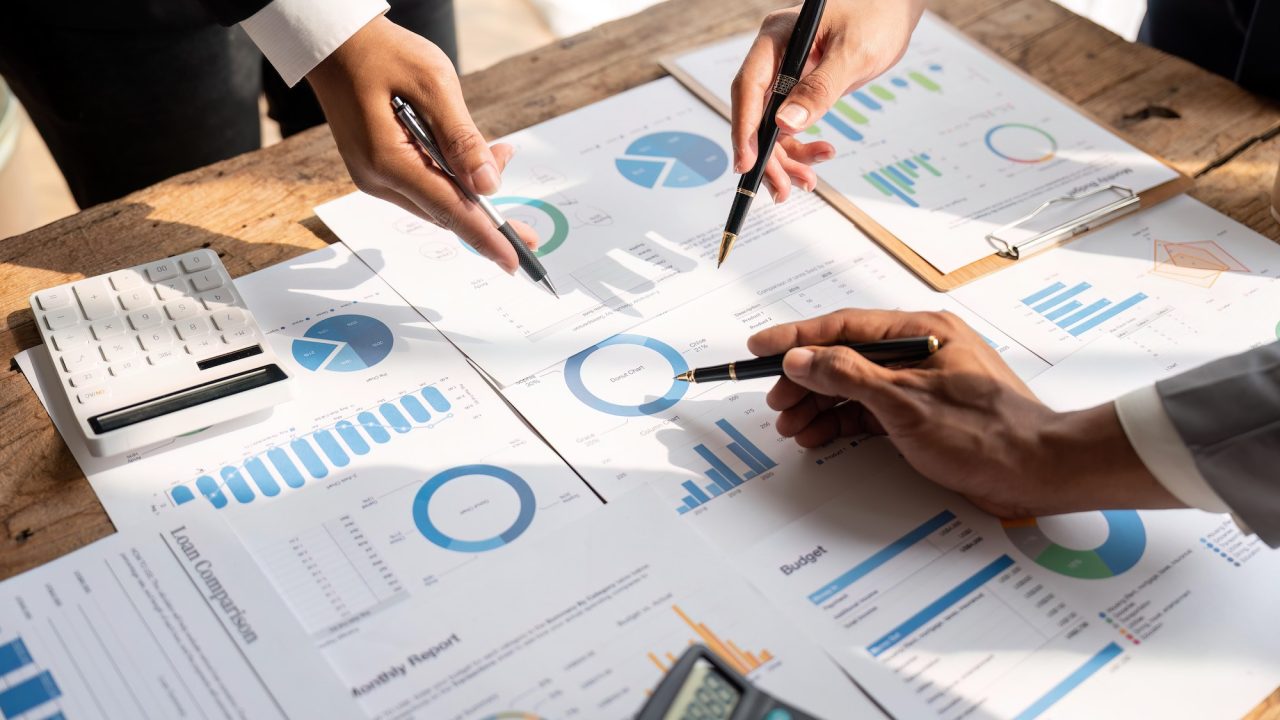 business-people-analyzing-statistics-financial-analysis-data-chart-graph-concept.jpg